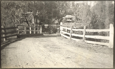 Shows a wooden bridge in Marysville in Victoria.