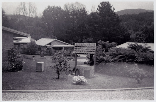 A black and white photograph that shows a few of the residential units that were situated in The Village in Marysville in Victoria.