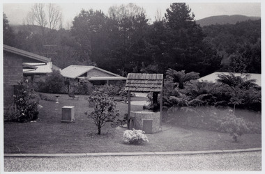 A black and white photograph that shows a few of the residential units that were situated in The Village in Marysville in Victoria.