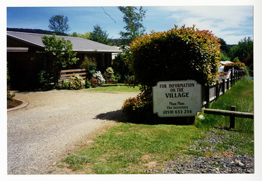 A colour photograph that shows the entrance to the The Village in Marysville in Victoria.