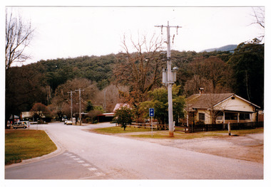 Shows the view looking down Pack Road towards Murchison Street in Marysville in Victoria. 