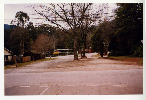 Shows a view looking across Pack Road in Marysville in Victoria.