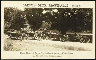 Shows the Barton Bros fleet of Super Six Hudson cars leaving the main street in Marysville for the different beauty spots in and around Marysville with tourists on board.