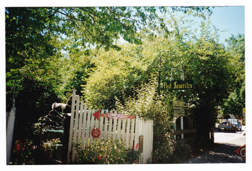 Shows the cream picket fence that was outside Past Favorites in Marysville in Victoria.