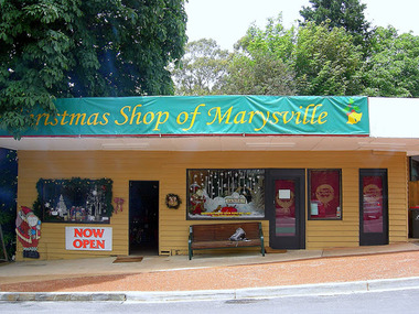 Shows the front facade of The Christmas Shop in Marysville.