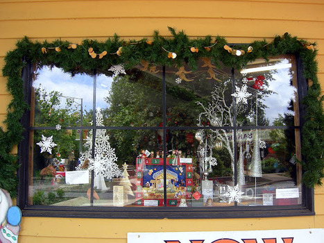 Shows the front window display in The Christmas Shop in Maryville.