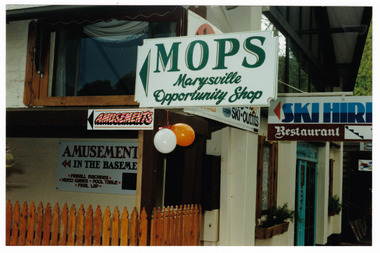 Shows a colour photograph of the entrance way to MOPS-Marysville Opportunity Shop.
