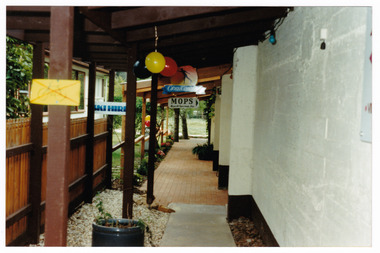 Shows a colour photograph of the entrance way to MOPS-Marysville Opportunity Shop.