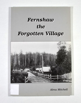 Shows a black and white photograph of the village of Fernshaw that was taken by John Lindt. Shows a road bordered with wooden fences that leads into the village of several buildings. Behind the village is forest. The title of the book is in black above the photograph and the author's name is below the photograph.