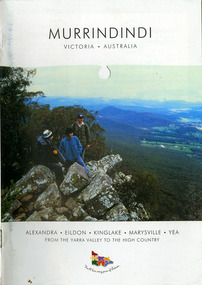 Shows an information booklet on the Murrindindi region in Victoria. Front cover shows a photograph of three men standing at the top of a mountain overlooking a valley.