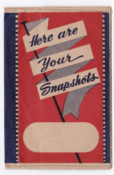 Shows a red, black and cream envelope with the title in black. 