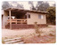 Shows a set of eight photographs of the exterior and interior of Blackwood Cottages in Marysville. Also shows photographs of the gardens surrounding the cottages.