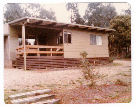 Shows a set of eight photographs of the exterior and interior of Blackwood Cottages in Marysville. Also shows photographs of the gardens surrounding the cottages.