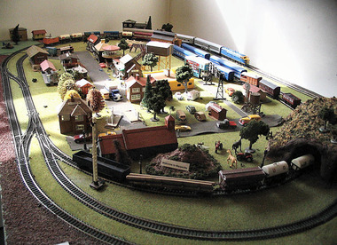 Shows a train track set up. This train track was part of the display in Manical Mechanicals in Marysville in Victoria.