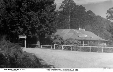 A digital copy of a black and white postcard of The Crossways in Marysville produced by the Rose Stereograph Company.