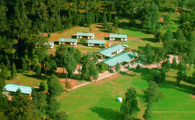 A colour photograph of an aerial view of the lodges at the E.S.A. Camping and Conference Centre in Marysville.