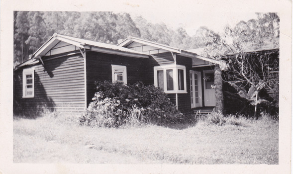 A black and white photograph of one of the accommodation flats at the Fruit Salad Farm in Marysville.