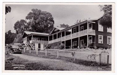 A black and white postcard from Greenlands guest house in Marysville that was produced by Valentine's Publishing Co Pty. Ltd. as a souvenir of Marysville.