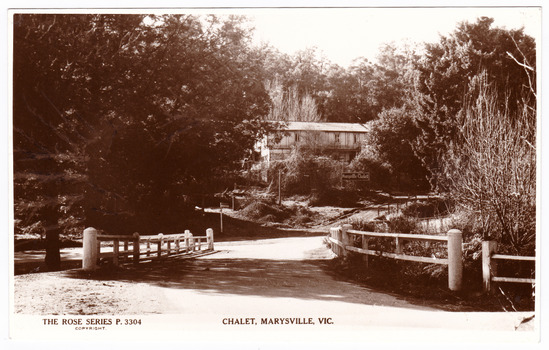 A black and white photograph of a postcard of the Marysville Chalet that was produced by the Rose Stereograph Company.