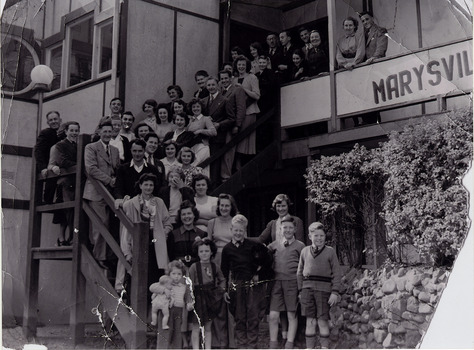 A black and white photograph of an unknown group of people at The Marysville Chalet that was taken in September 1948.