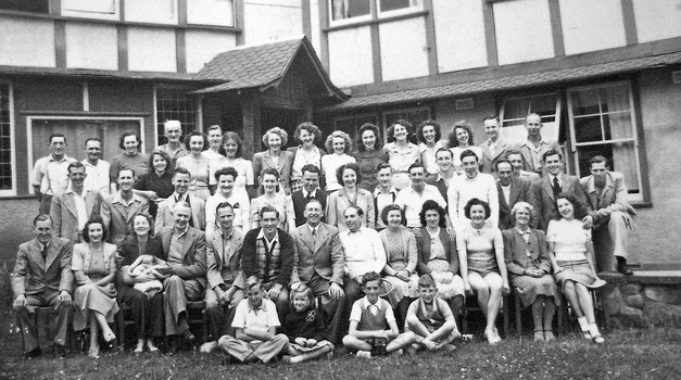 A digital copy of a black and white photograph of an unknown group of people at the Marysville Chalet.