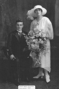 A digital copy of a black and white photograph of Arthur and Grace Dickinson on their wedding day in 1923. Arthur built Marysville House in the late 1920s and they ran it as a guest house.