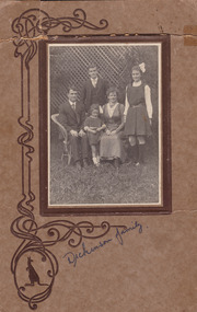 A digital copy of a black and white photograph of the Dickinson Family taken in 1917.