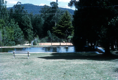 A digital copy of a colour photograph of the swimming pool at Mountain Lodge in Marysville that was taken in 1971.