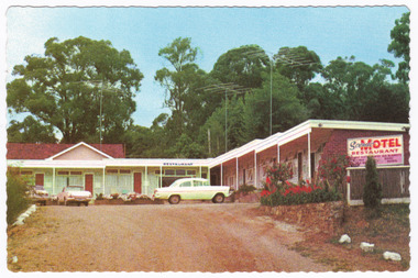 A colour postcard of the Scenic Motel in Marysville. The postcard was produced by John Sands Pty. Ltd. as a souvenir of Marysville.