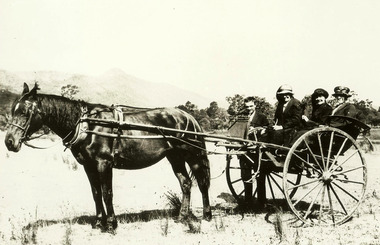 A digital copy of a black and white photograph of Dick and Louise Batchelor and guests. The Batchelor Family owned and operated Taggerty House near Taggerty in Victoria.