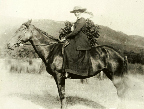 A digital copy of a black and white photograph of Emily Batchelor on horseback. The Batchelor Family owned and operated Taggerty House near Taggerty in Victoria.