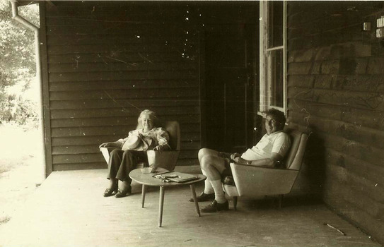 A digital copy of a black and white photograph of an unknown couple named as Claire and Rick on the verandah at Taggerty House near Taggerty in Victoria. The photograph was taken in 1983.