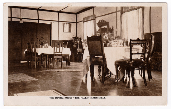 A black and white postcard of The Falls guest house in Marysville. The postcard was produced by the Rose Stereograph Company as a souvenir of Marysville. On the reverse is a handwritten message.