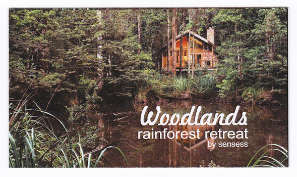 A business card regarding Woodlands Rainforest Retreat in Narbethong.