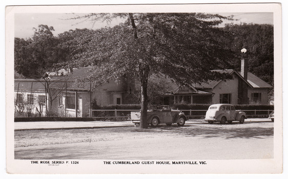 A black and white postcard of The Cumberland Guest House in Marysville. The postcard was produced by the Rose Stereograph Co. as a souvenir of Marysville. On the reverse of the postcard is a space to write a message and an address and to place a postage stamp. The postcard is unused.