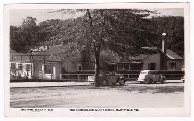 A black and white postcard of The Cumberland Guest House in Marysville. The postcard was produced by the Rose Stereograph Co. as a souvenir of Marysville. On the reverse of the postcard is a space to write a message and an address and to place a postage stamp. The postcard is unused.