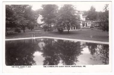 A black and white postcard of The Cumberland Guest House in Marysville. The postcard was produced by the Rose Stereograph Co. as a souvenir of Marysville. On the reverse of the postcard is a space to write a message and an address and to place a postage stamp. The postcard is unused.