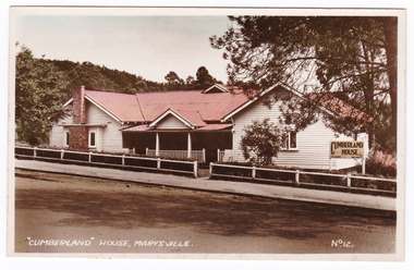 A colour postcard of Cumberland House in Marysville. The postcard was produced by The Valentine Publishing Co. as a souvenir of Marysville. On the reverse of the postcard is a space to write a message and an address and to place a postage stamp. The postcard is unused.