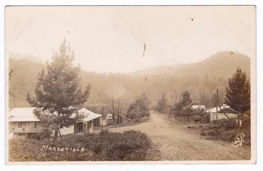 An early sepia postcard of Keppel's Hotel in Marysville. The hotel was originally built and opened by the Keppel Family in 1865. The Keppel's Australian Hotel was the first hotel to be opened in Marysville. The Keppel Family were among Marysville's earliest pioneering families. On the reverse of the postcard is a space to write a message and an address and to place a postage stamp. The postcard is unused.