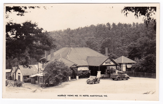 A black and white postcard of the Australian Hotel in Marysville that was produced by Murray Views as a souvenir of Marysville. The hotel was originally built and opened by the Keppel Family in 1865. The Keppel's Australian Hotel was the first hotel to be opened in Marysville. The Keppel Family were among Marysville's earliest pioneering families. 