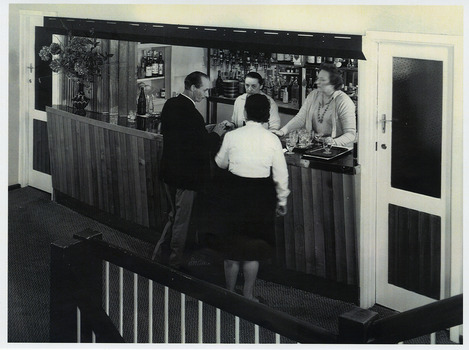 A copy of a black and white photograph taken at the bar in the Marysville Hotel Motel in Marysville. The original photograph was taken in 1969.