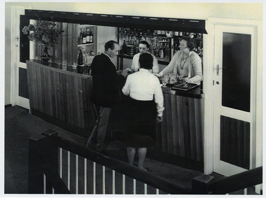 A copy of a black and white photograph taken at the bar in the Marysville Hotel Motel in Marysville. The original photograph was taken in 1969.