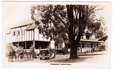 A black and white postcard from Kooringa Guesthouse in Marysville. The original house was built in 1914 for Frederick Webb by the Cuzens Brothers. The postcard was produced by the Rose Stereograph Co. as a souvenir of Marysville. On the reverse of the postcard is a space to write a message and an address and to place a postage stamp. The postcard is unused.