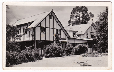 A black and white postcard from Kooringa Guesthouse in Marysville. The original house was built in 1914 for Frederick Webb by the Cuzens Brothers. The postcard was produced by Valentine's as a souvenir of Marysville.