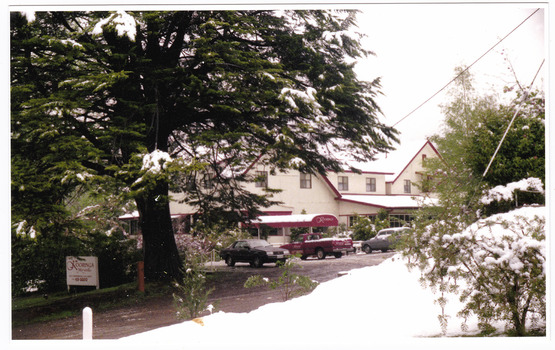 A colour photograph taken at Kooringa Conference Centre in Marysville. The photograph is of the front entrance to the main building ans was taken after a snowfall.