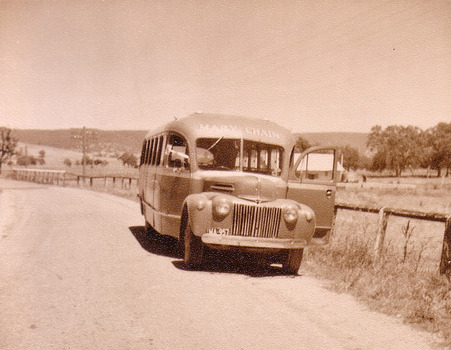 A digital copy of a black and white photograph of the Mary Chain Tourists Bus. The Mary Chain Guesthouses were built in the depression years by Eric Dowdle. The original photograph was taken in the 1950s.
