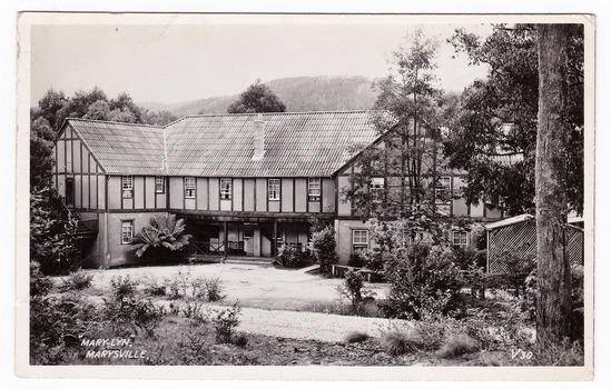 A black and white postcard from Mary-Lyn Guest House in Marysville. Mary-Lyn was a part of the Mary Chain of guest houses built by Eric Dowdle in the Depression years. The postcard was produced by Valentine Publishing Co. Pty. Ltd. as a souvenir of Marysville. On the reverse is a hand-written message.