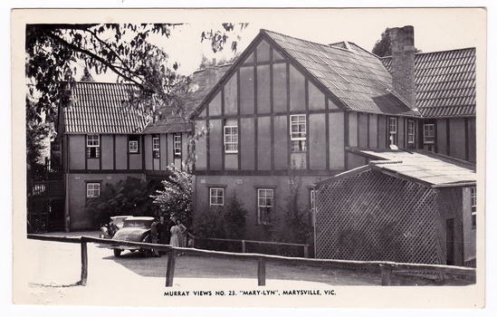 A black and white postcard from Mary-Lyn Guest House in Marysville. Mary-Lyn was a part of the Mary Chain of guest houses built by Eric Dowdle in the Depression years. The postcard was produced by Murray Views as a souvenir of Marysville. On the reverse is a handwritten message.