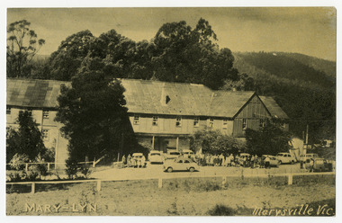 A black and white postcard from Mary-Lyn Guest House in Marysville. Mary-Lyn was a part of the Mary Chain of guest houses built by Eric Dowdle in the Depression years. On the reverse is a space to write a message and an address and to place a postage stamp. The postcard is unused.