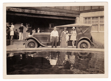 A black and white photograph taken outside at Mary-Lyn Guest House in Marysville. Mary-Lyn was a part of the Mary Chain of guest houses built by Eric Dowdle in the Depression years. The photograph was taken in approximately 1932.